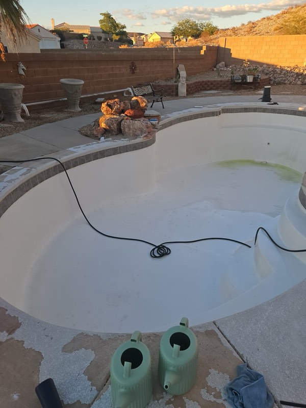 The Bullhead City fiberglass pool drained and cleaned, ready for a refill